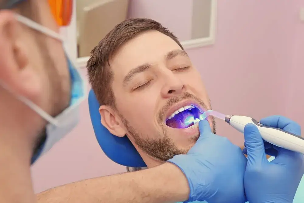 dentist examining tooth pain